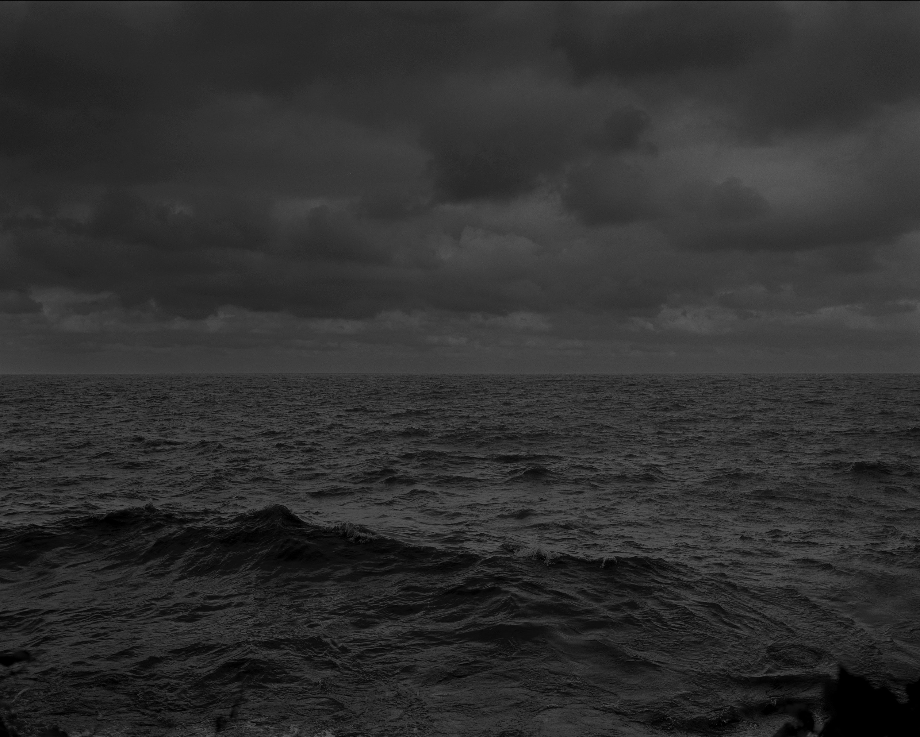 a black and white photo of the water in lake erie.